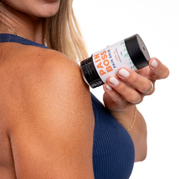 Woman applying Pain Boss